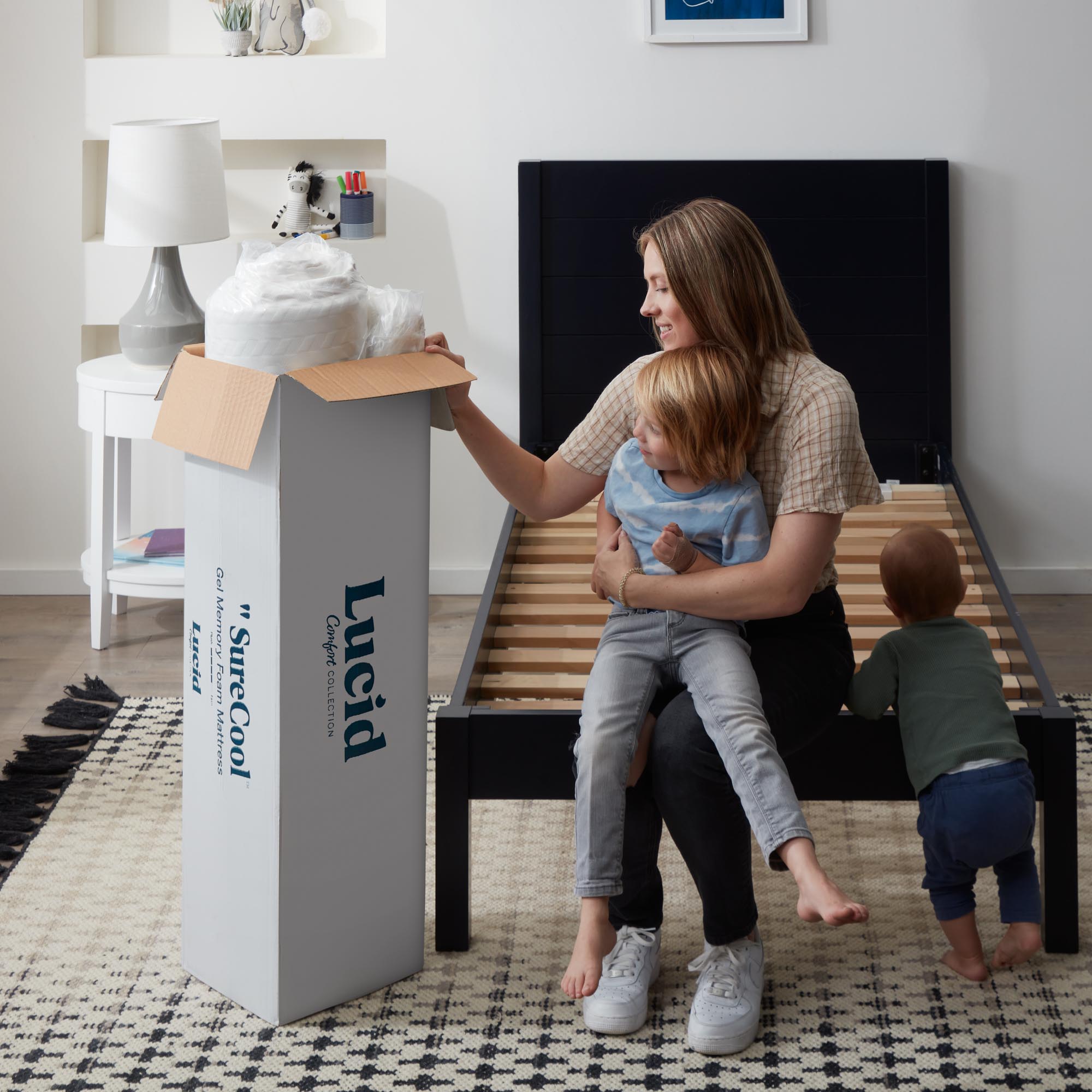 Woman unboxing mattress